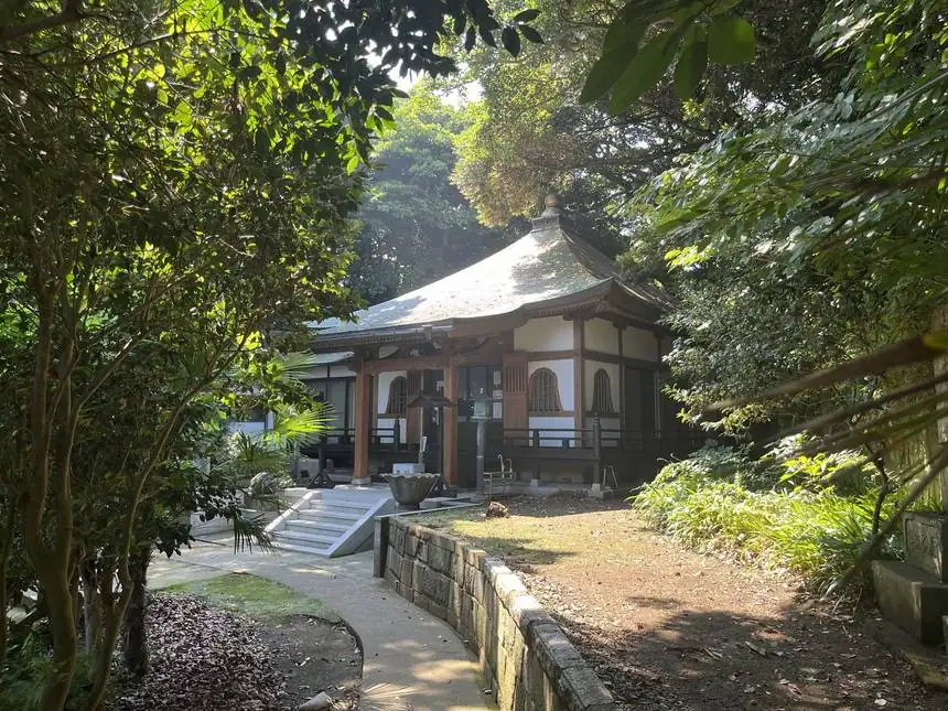 A quiet temple tucked among the trees in Japan